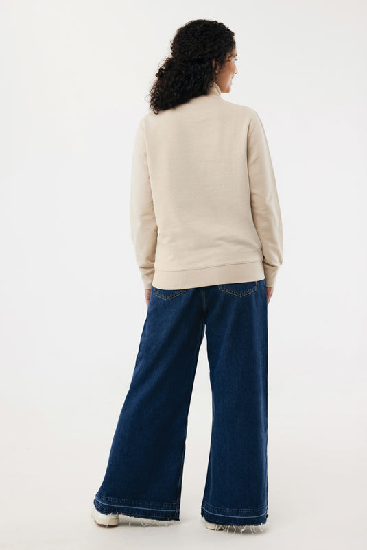 iqoniq Elgon recycled cotton quarter-zip sweater, close-up of soft, eco-friendly textile fabric with quarter-zip detail.