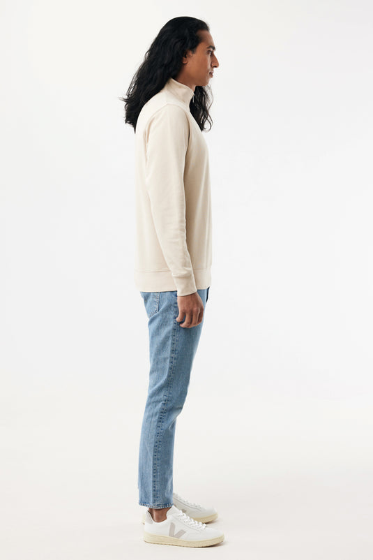 Iqoniq Elgon recycled cotton quarter zip sweater, showing the textile's soft fabric and quarter-zip neckline on a neutral background.