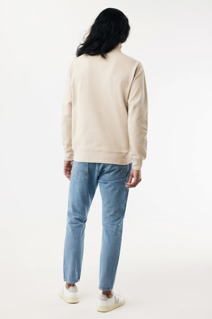 Load image into Gallery viewer, Iqoniq Elgon recycled cotton quarter-zip sweater, close-up of teal textile with zipper detail and textured fabric.
