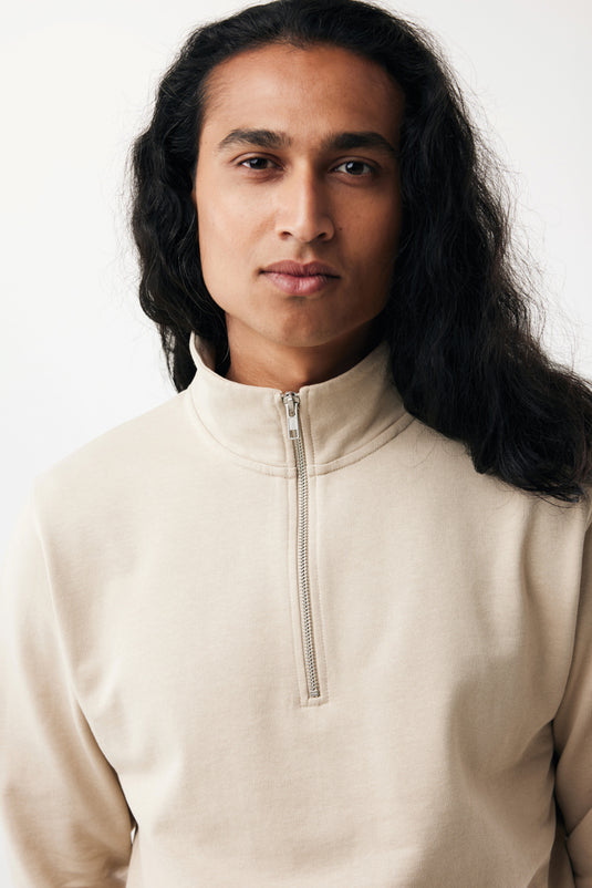Iqoniq Elgon recycled cotton quarter zip sweater, close-up of the textile fabric and quarter zip detail.
