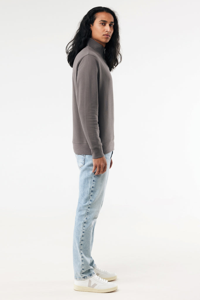 Load image into Gallery viewer, Iqoniq Elgon recycled cotton quarter zip sweater in textile, featuring a close-up view of the cozy, eco-friendly fabric and design.
