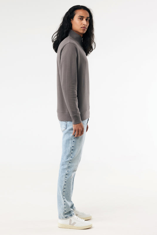 Iqoniq Elgon recycled cotton quarter zip sweater in textile, featuring a close-up view of the cozy, eco-friendly fabric and design.