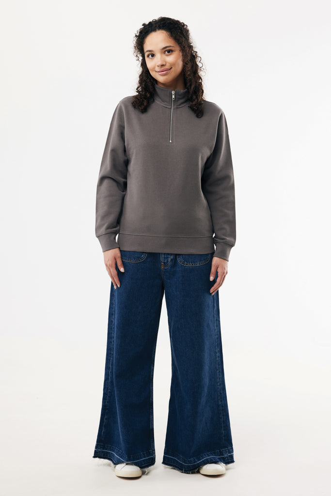 Load image into Gallery viewer, Iqoniq Elgon recycled cotton quarter zip sweater, close-up of the eco-friendly textile with a quarter zip detail.
