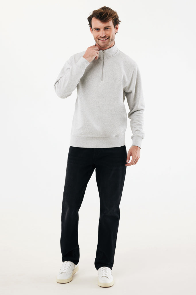Load image into Gallery viewer, Iqoniq Elgon recycled cotton quarter zip sweater, close-up of navy textile with zipper detail and textured fabric.
