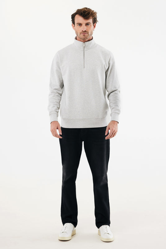 Iqoniq Elgon recycled cotton quarter zip sweater, close-up of the textile showing the fabric texture and quarter zip detail.