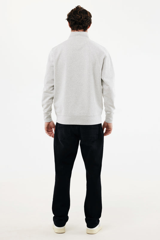 Iqoniq Elgon recycled cotton quarter zip sweater, close-up of the textile fabric showing the recycled cotton material and quarter zip detail.