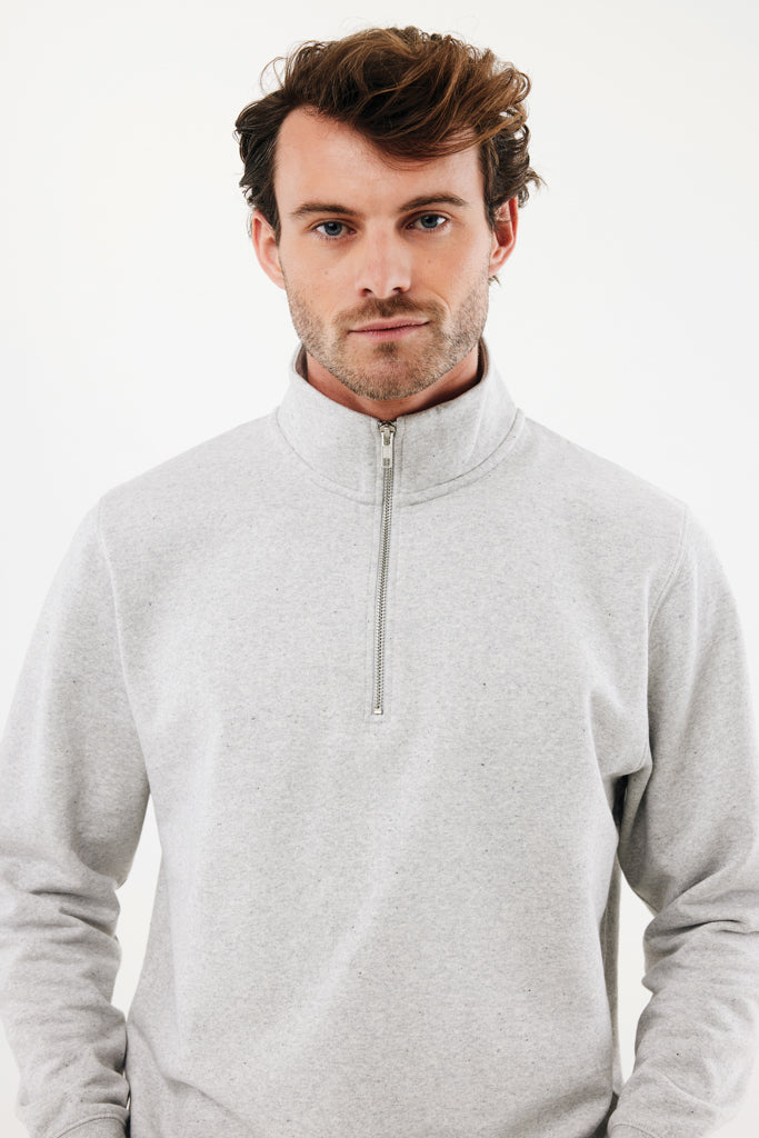 Load image into Gallery viewer, Iqoniq Elgon recycled cotton quarter zip sweater, close-up of the textile fabric with a quarter zip closure and soft texture.
