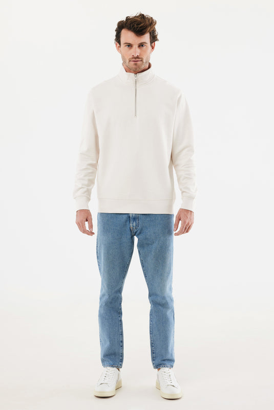 Iqoniq Elgon recycled cotton quarter zip sweater displayed in a textile image, showcasing its fabric texture and design details.