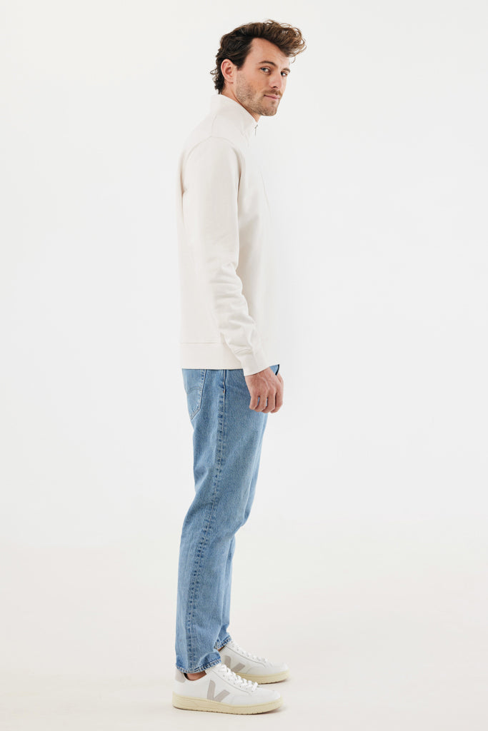 Load image into Gallery viewer, Iqoniq Elgon recycled cotton quarter zip sweater, close-up of the textured fabric and quarter-length zipper detail.
