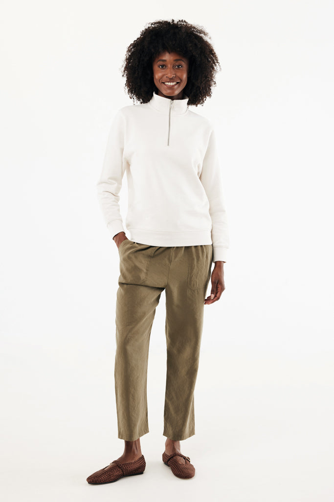 Load image into Gallery viewer, IQONIQ Elgon recycled cotton quarter zip sweater, close-up of soft textile with quarter zip neckline and textured fabric.
