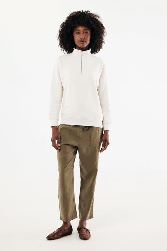 Iqoniq Elgon recycled cotton quarter zip sweater, close-up of the textile fabric showing the knit and quarter zip detail.