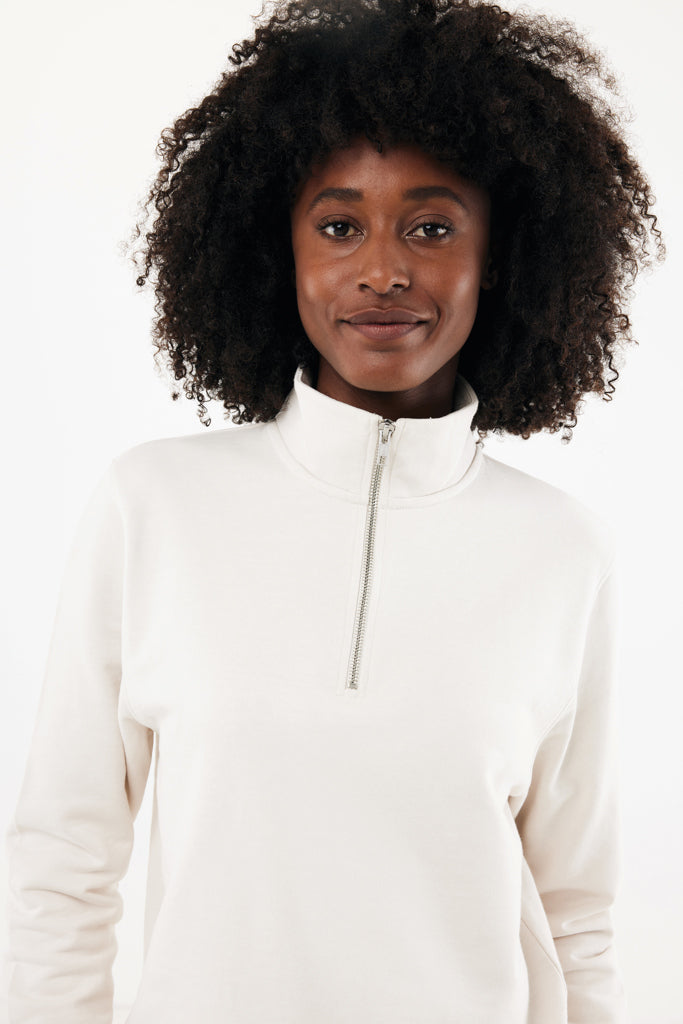 Load image into Gallery viewer, iqoniq Elgon recycled cotton quarter zip sweater, close-up of the textured textile fabric and quarter zip detail.
