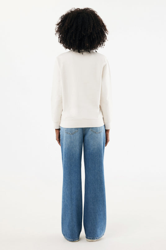 Iqoniq Elgon recycled cotton quarter zip sweater, close-up of soft textile fabric with quarter zip detail.