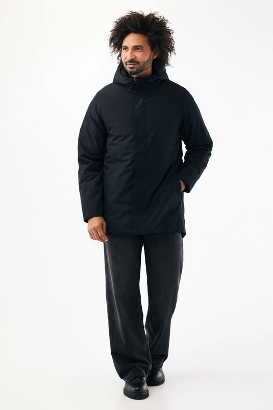 Iqoniq Thelon recycled polyester parka, stylish textile coat with a hood, shown in a close-up view of the fabric and design details.