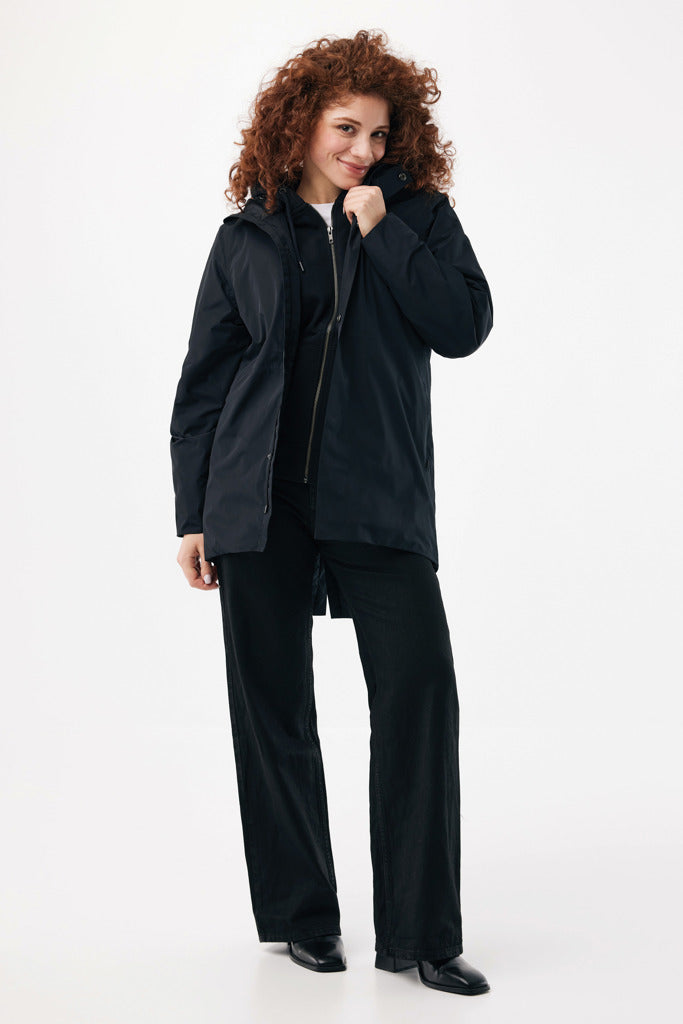 Load image into Gallery viewer, Iqoniq Thelon recycled polyester parka in textile, featuring a stylish, eco-friendly design with a hood and front zipper.
