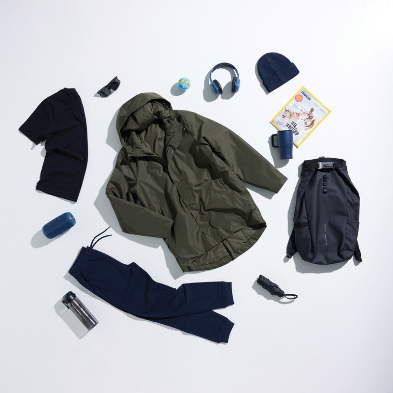Load image into Gallery viewer, Iqoniq Thelon recycled polyester parka in textile, shown in a close-up view with fabric texture and stitching details.
