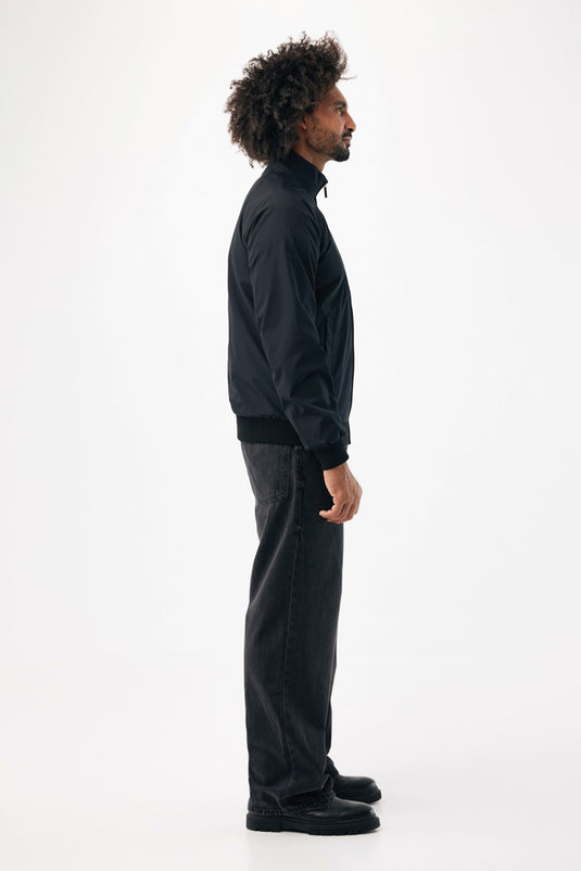 Iqoniq Odin recycled polyester urban jacket displayed with front view, showcasing the eco-friendly textile and modern design.