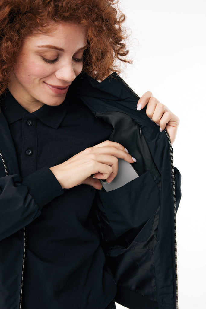 Load image into Gallery viewer, Iqoniq Odin recycled polyester urban jacket in textile with a modern fit and eco-friendly design, shown on a mannequin.
