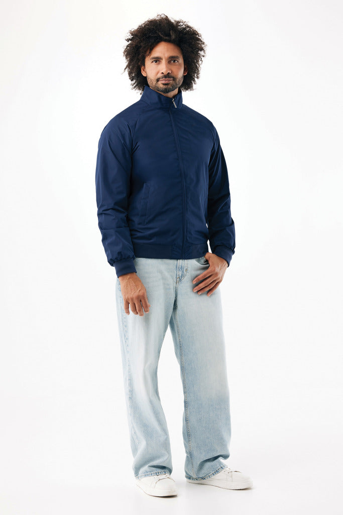 Load image into Gallery viewer, Iqoniq Odin recycled polyester urban jacket displayed on a textile mannequin, showcasing its modern design and eco-friendly fabric.
