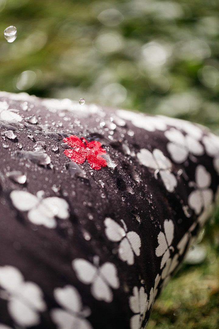 Load image into Gallery viewer, Fermob Trèfle Outdoor Cushion 68 x 44 cm – lifestyle
