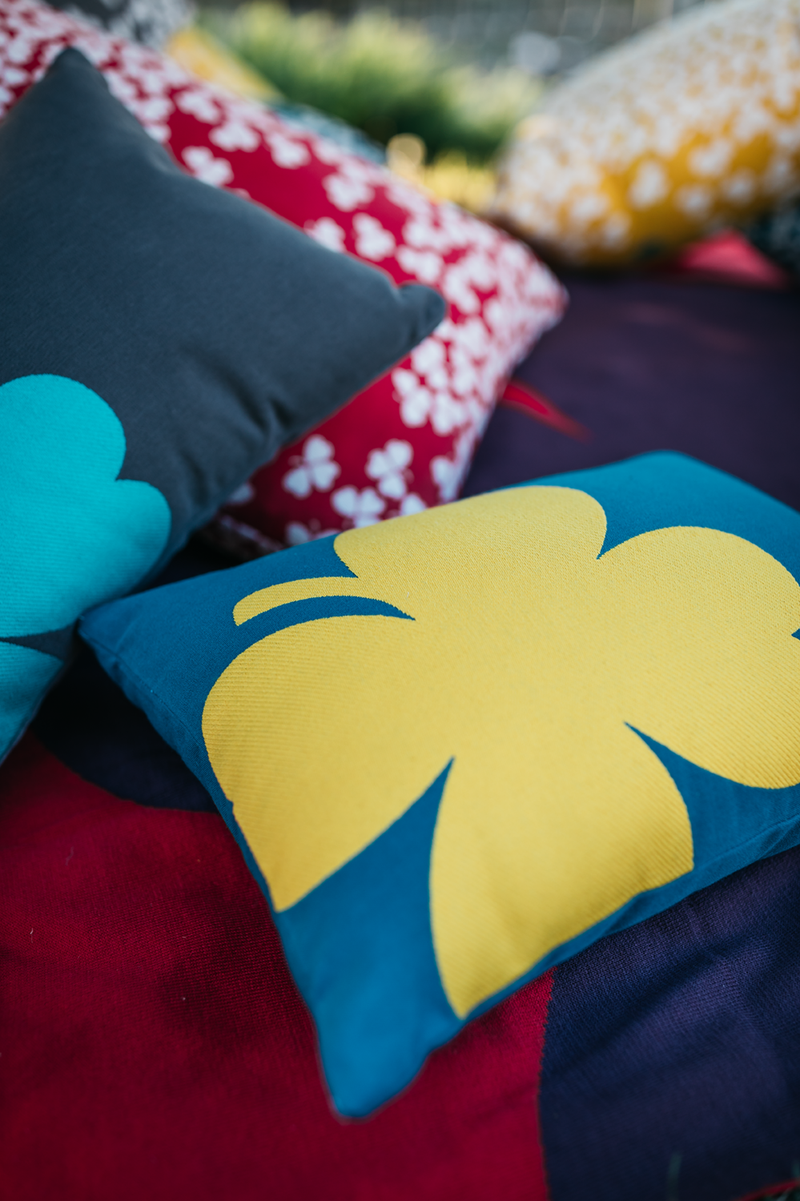 Load image into Gallery viewer, Fermob Trèfle Outdoor Cushion 44 x 30 cm – lifestyle
