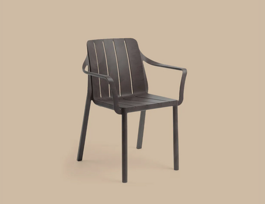Nardi Tiberina armchair in white plastic, stackable outdoor chair with a sleek, modern design suitable for patios and restaurants.