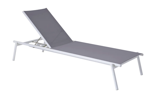 Fermob Pilotis V. Batyline® sunlounger with titanium frame and Batyline® fabric, ideal for outdoor poolside relaxation.