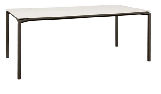 Fermob Calvi Aeris mineral dining table with eight seats, 195 x 95 cm, featuring a stylish tabletop and sturdy legs.