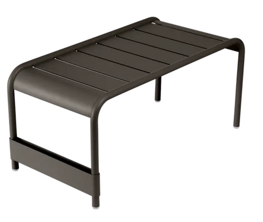 Fermob Luxembourg large low table or bench with rectangular shape, wooden top, and metal legs, measuring 86x44 cm.