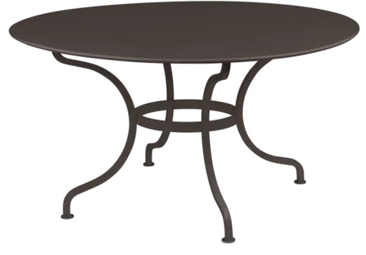 Fermob Romane Round Table with a Ø137cm top, ideal for up to 8 guests, shown in a vibrant outdoor setting.