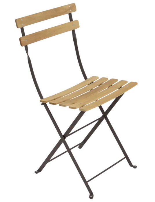 Fermob Tonka Bistro Natural Chair with wooden seat and metal frame, outdoor folding furniture for patio or garden.