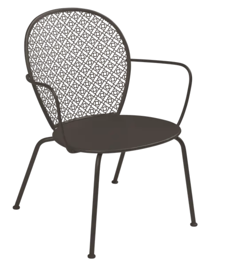 Load image into Gallery viewer, Fermob LORETTE low metal armchair with a modern design, featuring a curved backrest and sleek metal frame for outdoor use.
