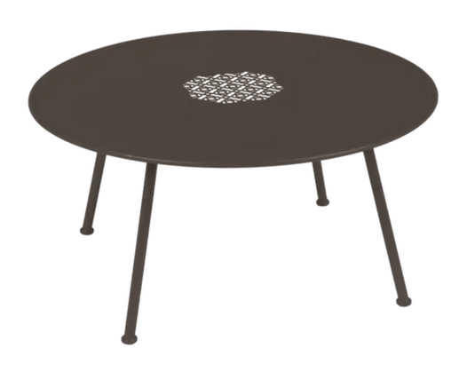 White Fermob Lorette low metal coffee table with an 80cm diameter, designed for outdoor use and fire-resistant.