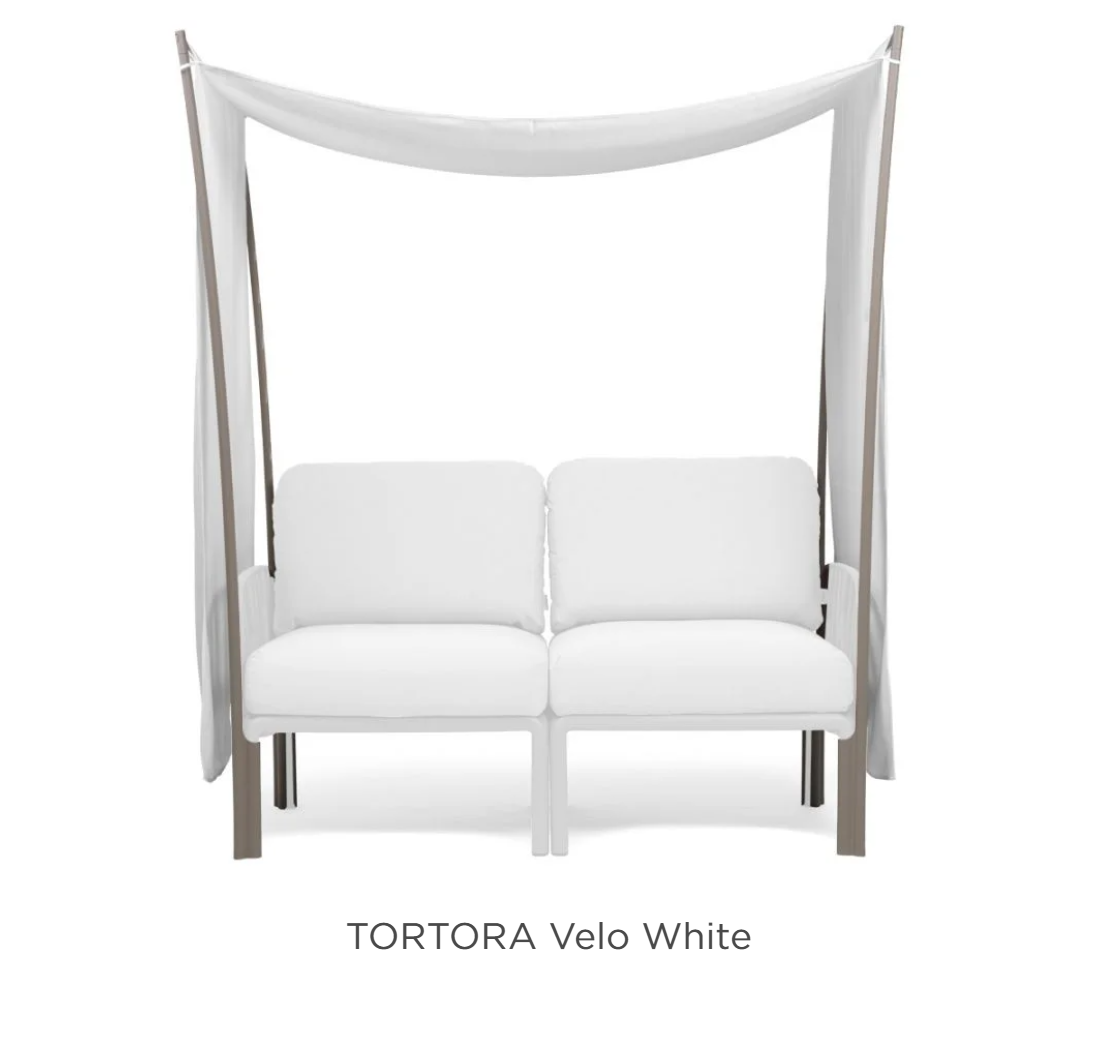 Nardi Komodo Ombra 2 Sunshade attached to a sofa, providing shade for outdoor patio furniture in a modern garden setting.