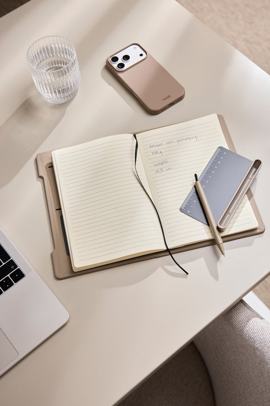 Vinga Baltimore RCS 4-in-1 refillable notebook with black cover and multiple paper sections for writing and organization.