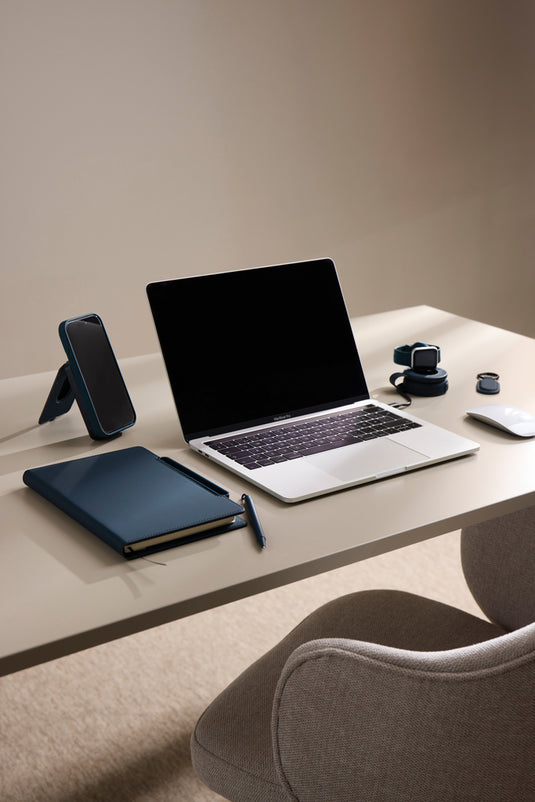 Vinga Baltimore RCS 4-in-1 refillable notebook with black cover and spiral binding, featuring multiple sections for note-taking and organization.
