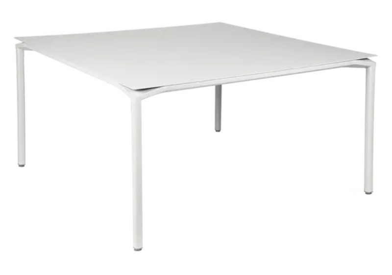Load image into Gallery viewer, White Fermob CALVI square dining table, 140x140 cm, designed for eight seats, with a sleek metal surface.

