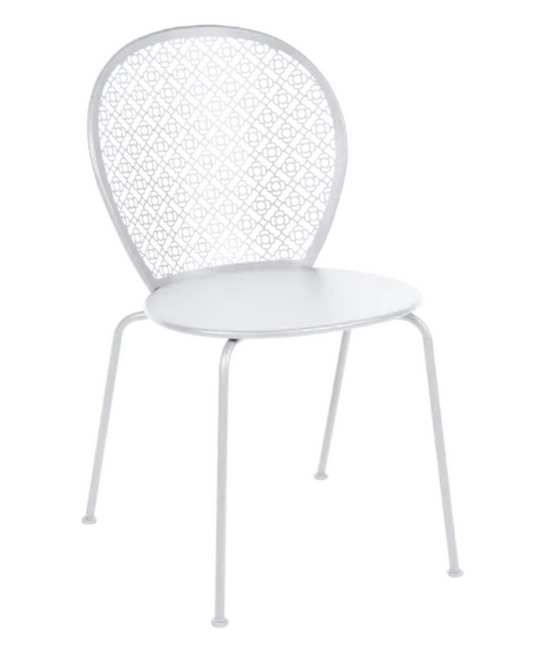 White Fermob Lorette metal outdoor chair with a sleek design, perfect for garden or patio seating.