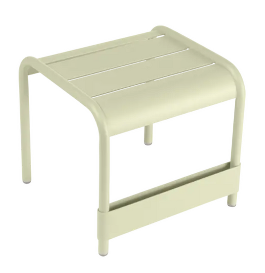 Fermob Luxembourg small low table or footrest in Willow Green, measuring 44x42 cm, suitable for indoor or outdoor use.