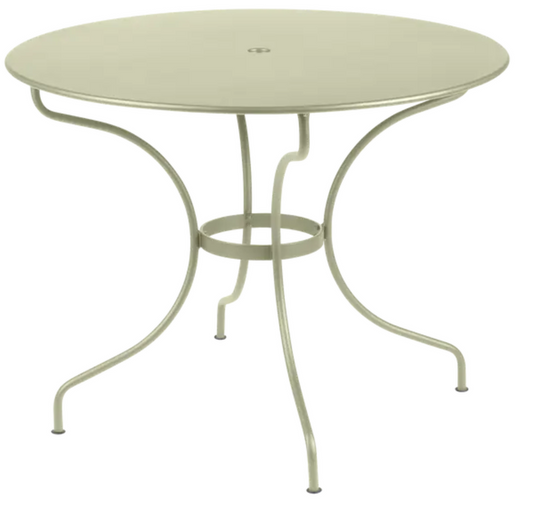 Fermob OPÉRA+ outdoor metal table in Willow Green with 96 cm diameter, ideal for five-seater patio dining.