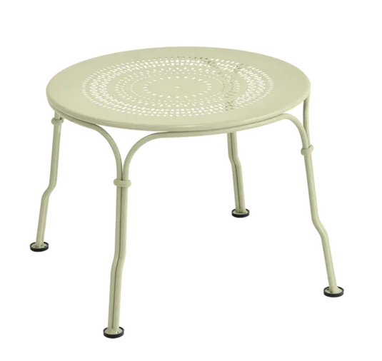 Fermob 1900 low metal table with 45cm diameter, white finish, round design, suitable for indoor or outdoor use.