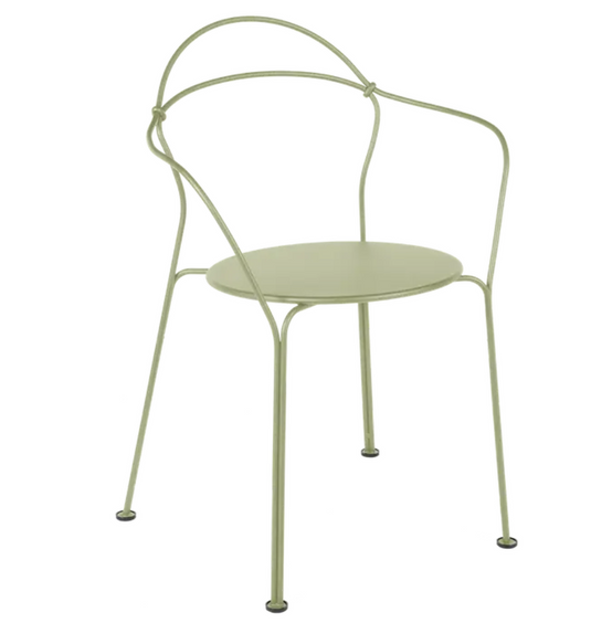 Willow green Fermob Airloop lounge chair made of metal, outdoor furniture with a modern, curved design for outdoor relaxation.