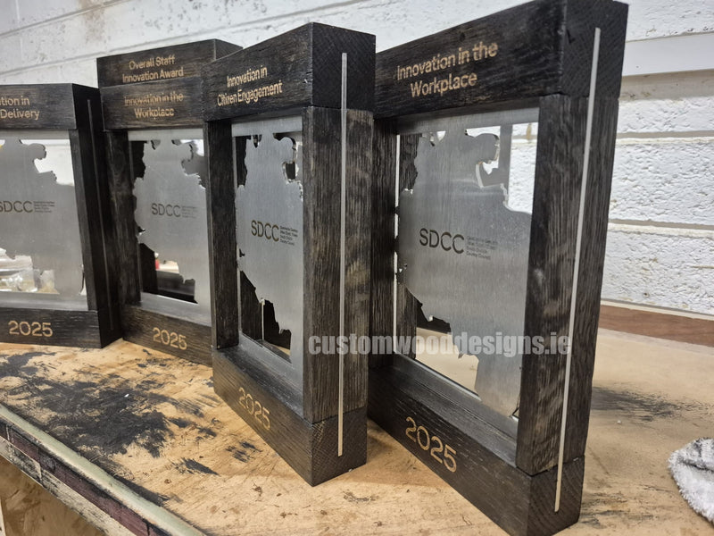 Load image into Gallery viewer, Custom Wood Designs wood and metal award plaques, custom-made awards with engraved designs on wood and metal surfaces.

