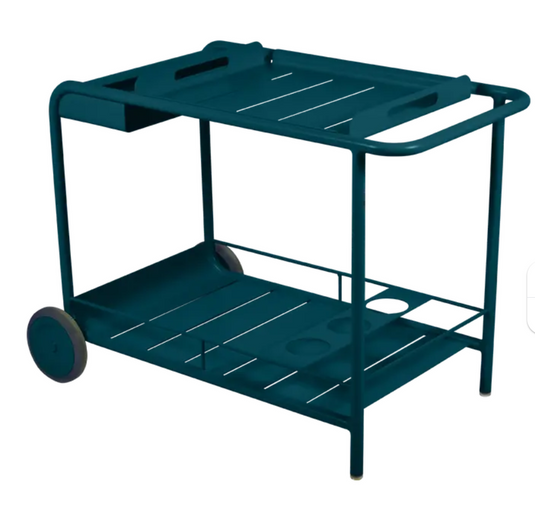 Fermob Luxembourg Side Bar trolley with wheels, blue color, designed for restaurant terrace drinks service, featuring a sleek table design.