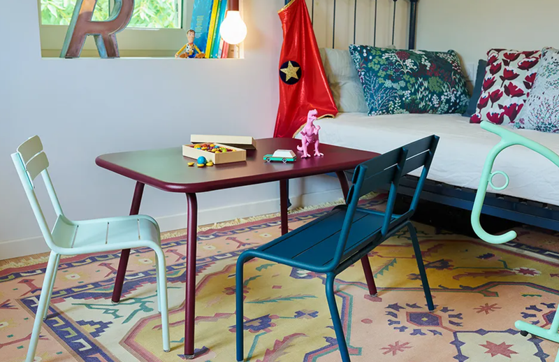 Load image into Gallery viewer, ADADA Rocking Horse – Fermob (Kids Restaurant Furniture) - Custom Wood DesignsFermob Luxembourg Kid Table with colorful children’s furniture and a rocking horse in a kids' play and waiting area.Kids Corner Furniture Fermob24575205547767Acapulco

