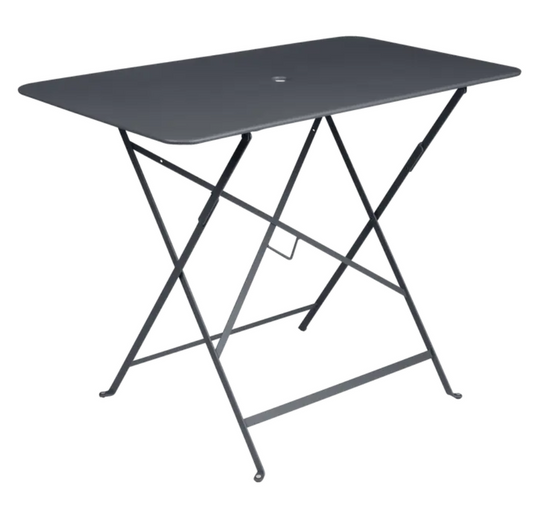 Fermob black foldable bistro table measuring 97x57 cm, ideal for restaurant terrace settings with a sleek metal design.