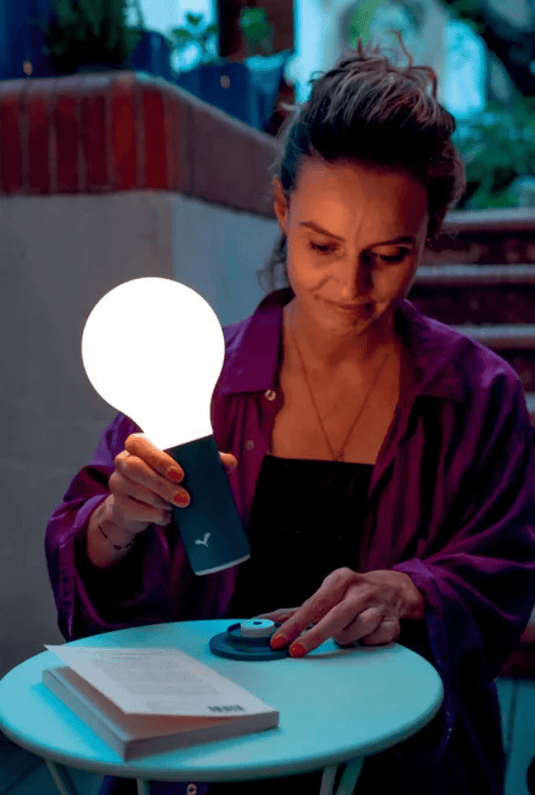 Fermob APLÔ Lamp H.24 with magnetic base, outdoor lighting fixture showcasing modern design and adjustable positioning
