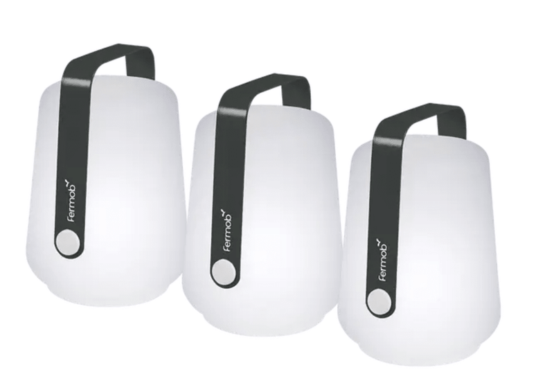 Load image into Gallery viewer, Set of three Fermob Balad mini outdoor lamps in antracite color, small ball-shaped lights measuring 12 cm tall.
