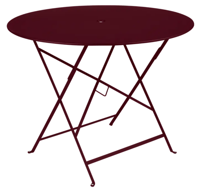 Load image into Gallery viewer, Fermob round bistro table with deep red metal finish, 96cm diameter, outdoor suitable with central parasol hole.
