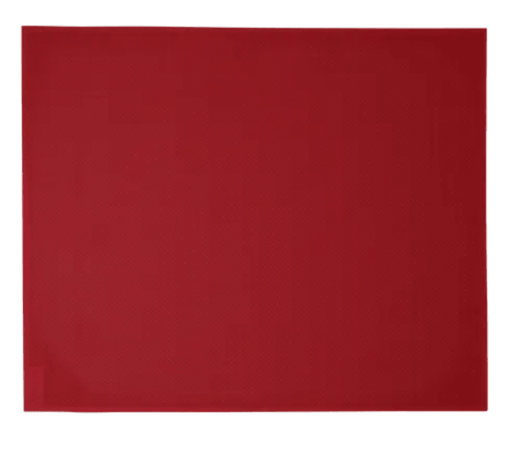 Load image into Gallery viewer, Fermob BASICS placemat in vibrant chili red, measuring 45 x 35 cm, made of durable material for table setting.
